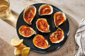 platter of bbq oysters with uni butter