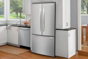 Frigidaire Refrigerator placed in a model kitchen 