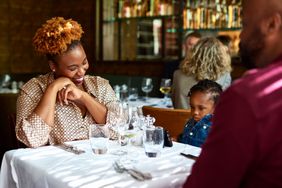 A family dines together at a restaurant