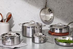 Hestan ProBond Collection Professional Clad 10 Piece Stainless Steel Cookware Set placed on kitchen table