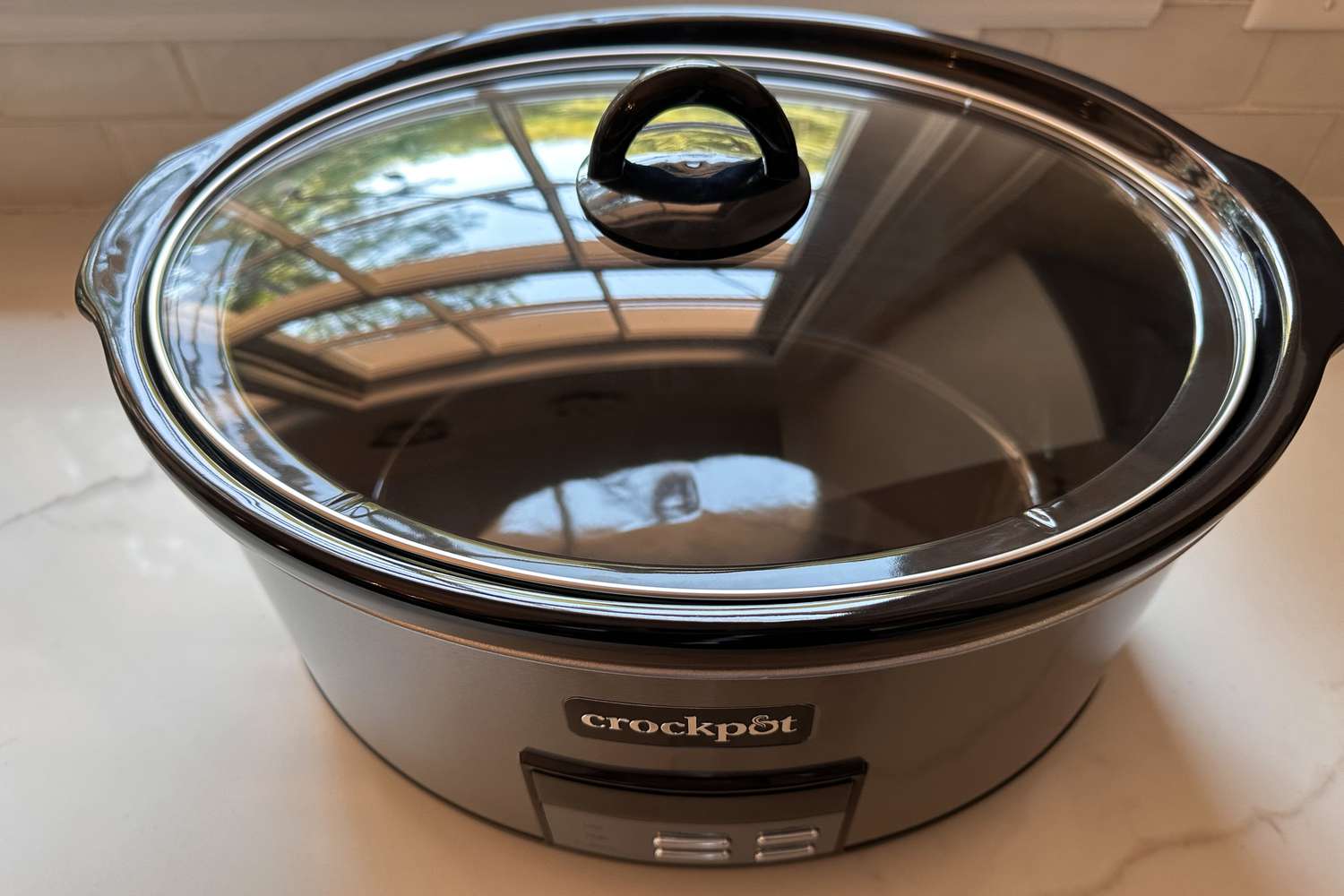 A top-down look at the empty Crock-Pot 8-Quart Large Programmable Slow Cooker with the lid on