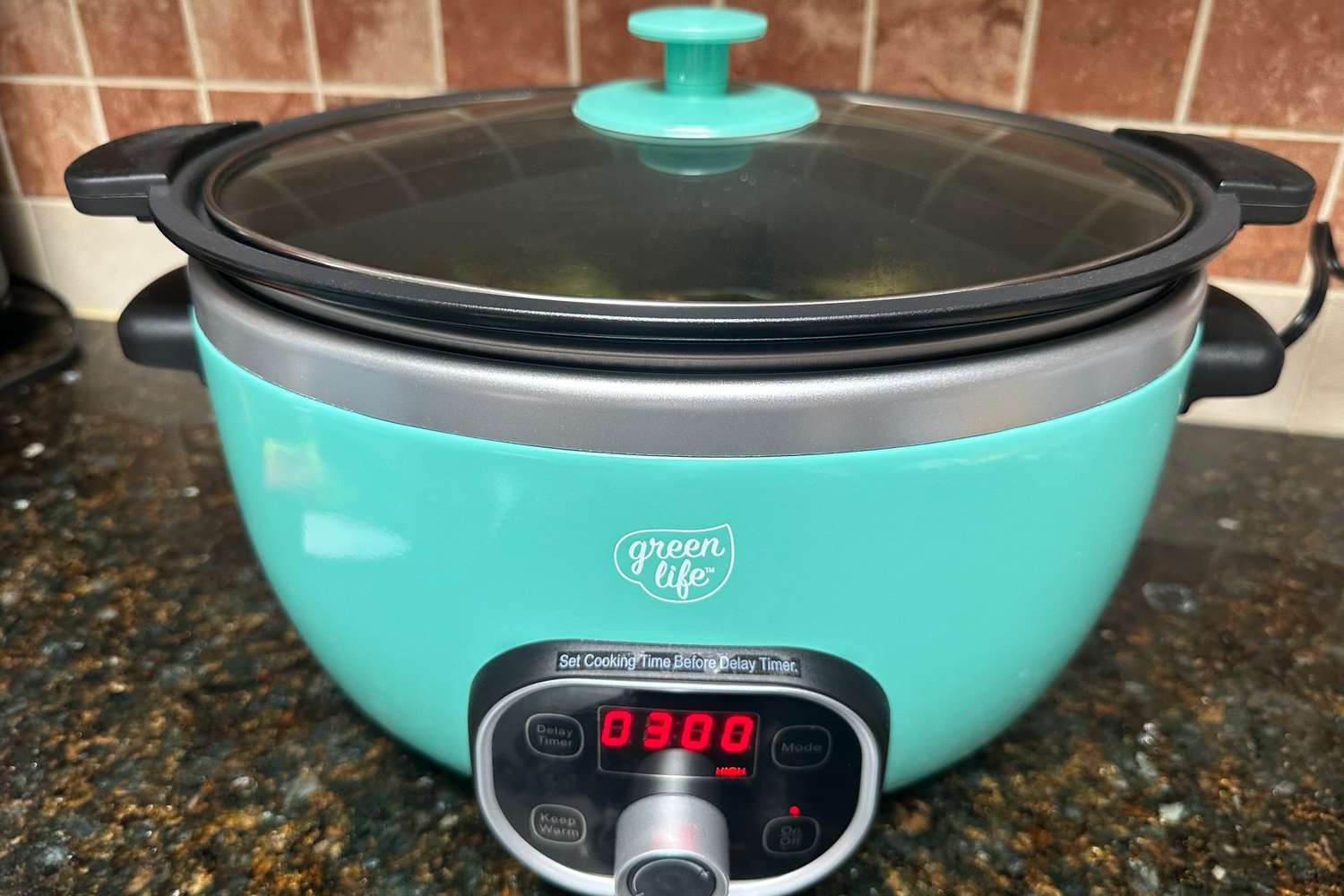 The GreenLife Cook Duo 6-Quart Nonstick Slow Cooker sitting on a kitchen counter