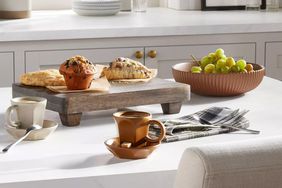 Hearth & Hand with Magnolia Footed Wood Serving Trivet on counter with breakfast