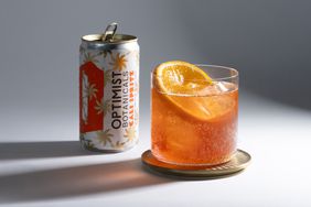 Optimist Botanicals NA Cali Spritz can next to a glass