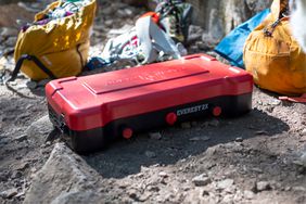 The Camp Chef Everest 2x Camping Stove outside in a campsite