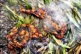 Chicken thighs on a grill